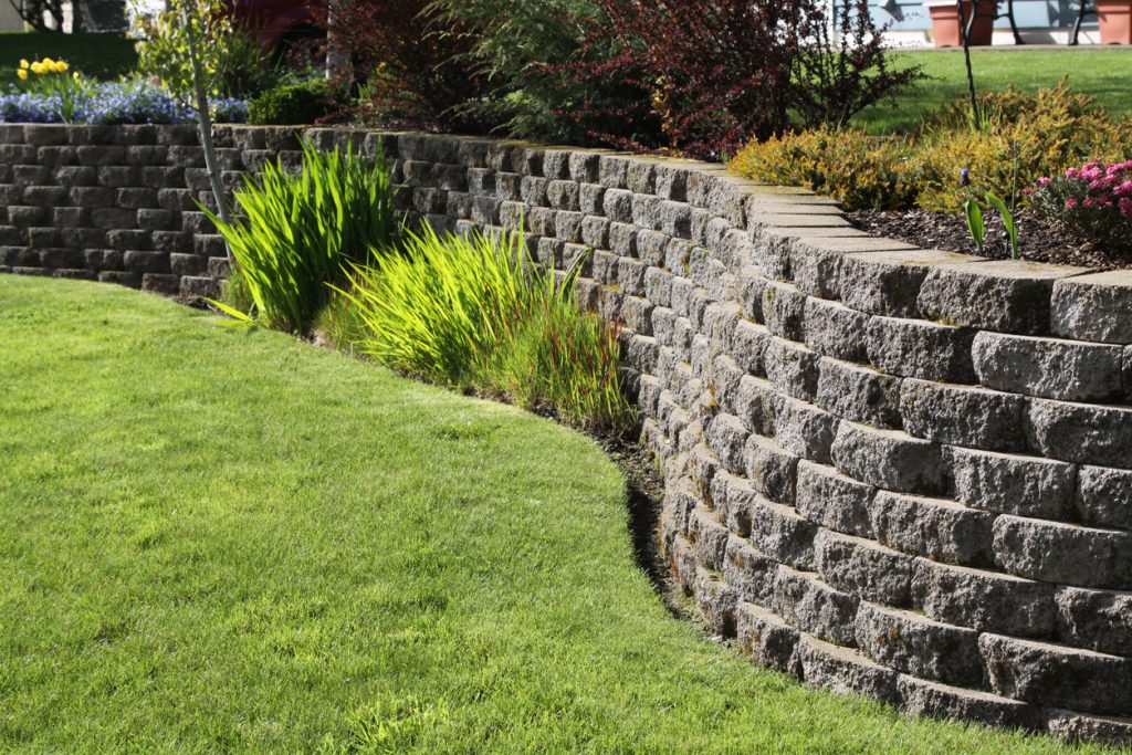 Landscaped Wall Of Cement Cobblestone Bricks
